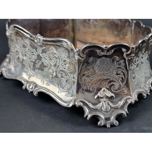 26 - A Victorian silver mounted cruet stand, by Hawkesworth, Eyre & Co, Sheffield 1855, 22cm wide.... 