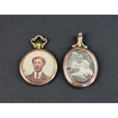 260A - A 9ct gold portrait pendant, Chester 1913, 26mm diameter; together with another similar yellow metal... 