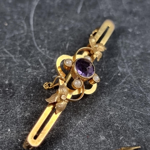 272 - A yellow metal amethyst and pearl bar brooch, stamped 9ct, 48mm; together with another base metal ba... 