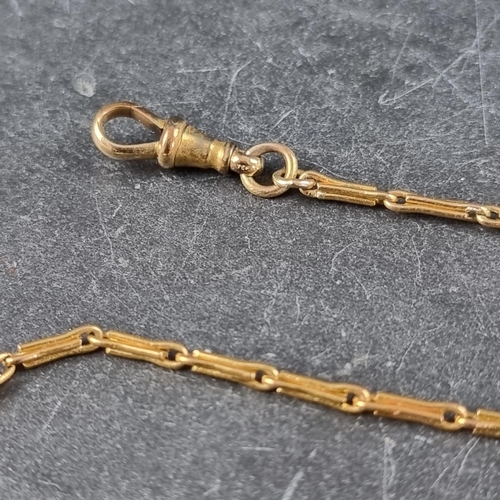 275 - A yellow metal watch chain, with attached gold plated Albert clasp, 37cm long excluding clasp.... 