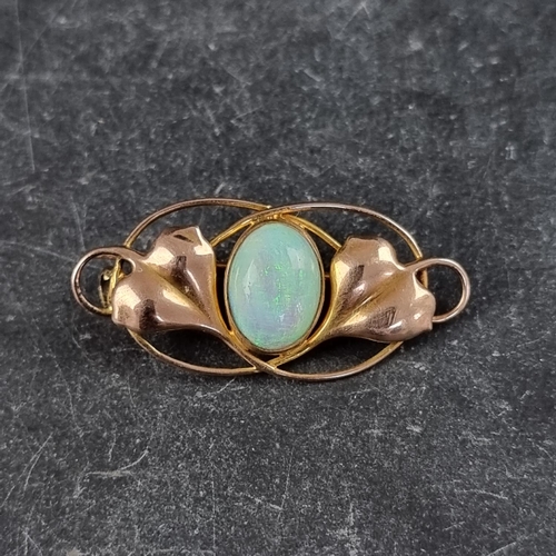 276 - An Art Nouveau yellow metal and cabochon opal brooch, by Murrle Bennett and Co, stamped 9ct, 34 x 16... 