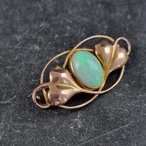 276 - An Art Nouveau yellow metal and cabochon opal brooch, by Murrle Bennett and Co, stamped 9ct, 34 x 16... 