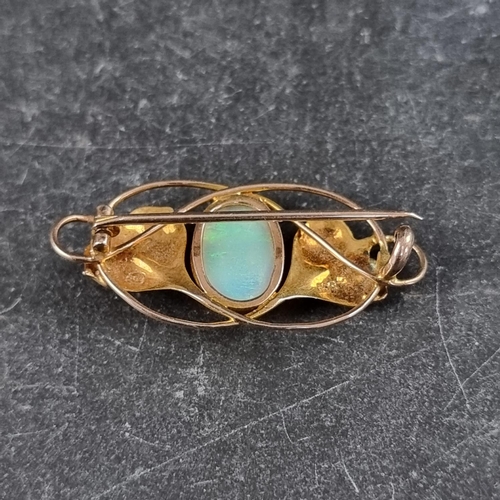 276 - An Art Nouveau yellow metal and cabochon opal brooch, by Murrle Bennett and Co, stamped 9ct, 34 x 16... 