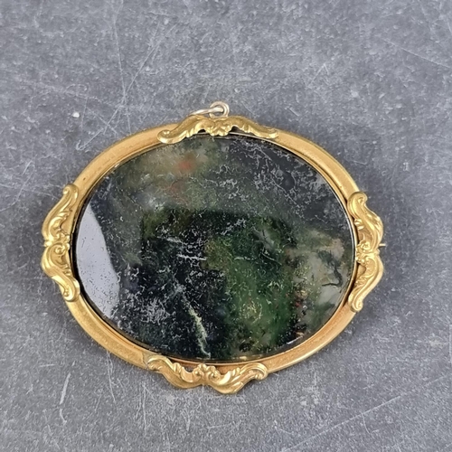 278 - A moss agate brooch, in a gilt metal frame, 55mm long.