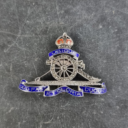 300 - A white metal, marcasite and enamel 'Royal Horse Artillery' sweetheart brooch, 41mm wide.... 