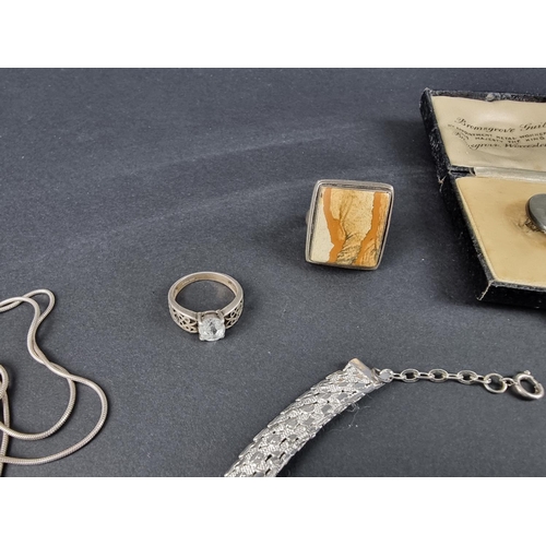 310 - A quantity of silver and white metal jewellery, stamped '925'.