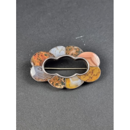 315 - A Scottish white metal brooch, set various stones, 6.2cm wide.