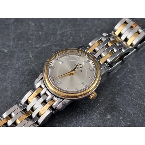 342 - A Omega 'De Ville' stainless steel bi-colour quartz ladies wristwatch, having diamond indices, 22mm,... 