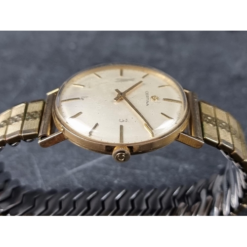 357 - A late 1960s Certina 9ct gold manual wind wristwatch, 34mm, Cal. 23-36, on later expanding brac... 