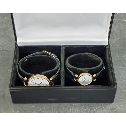 366 - A set of two similar Geneve 9ct gold quartz wristwatches, largest 32mm, both on black leather straps... 