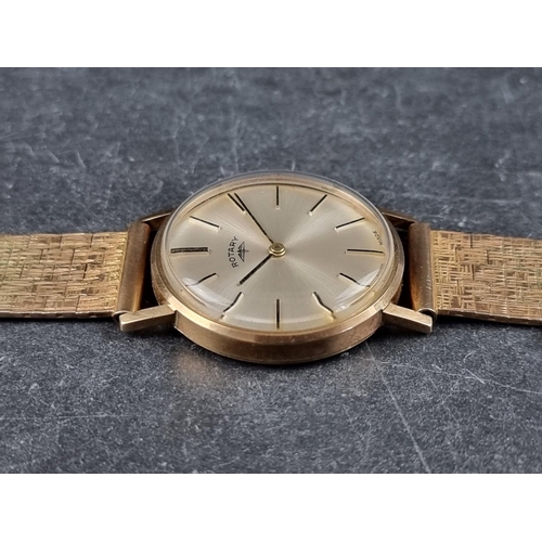 373 - A vintage Rotary 9ct gold manual wind wristwatch, 33mm, on 9ct gold bracelet.