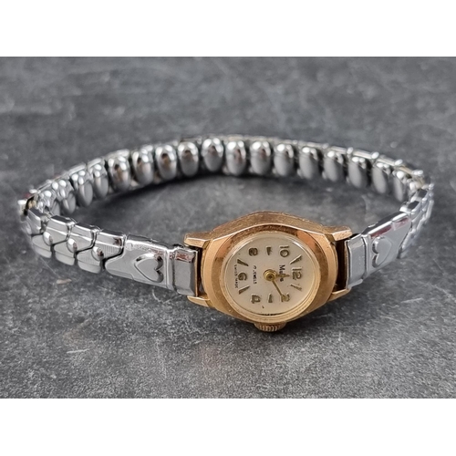 376 - A MuDu 18ct gold manual wind ladies wristwatch, 16mm, on later expanding bracelet.