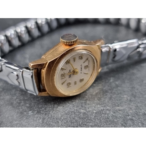 376 - A MuDu 18ct gold manual wind ladies wristwatch, 16mm, on later expanding bracelet.