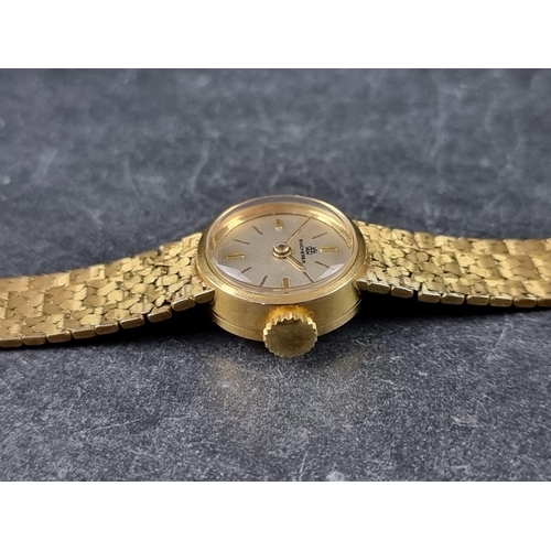 380 - A vintage Bucherer yellow metal manual wind ladies wristwatch, 17mm, stamped 18k, on original integr... 