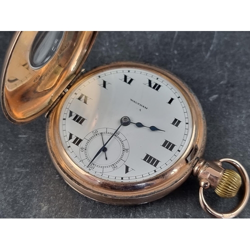 397 - A Waltham 9ct gold half hunter stem wind pocket watch, Chester 1930, 51mm, the dust cover with engra... 