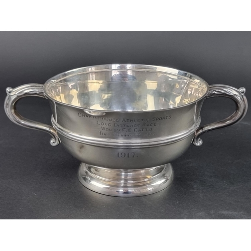 40 - A silver twin handled bowl, by Barker Bros, Chester 1912, 15cm diameter, 395g.