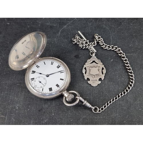 403 - A silver stem wind hunter pocket watch, 51mm, with unsigned Swiss movement, Birmingham 1920; togethe... 