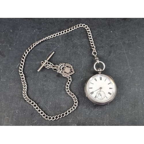 405 - A Victorian silver key wind open faced pocket watch, by C H Nicholls, Castleford, 53mm, No 12583, Ch... 