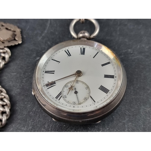 405 - A Victorian silver key wind open faced pocket watch, by C H Nicholls, Castleford, 53mm, No 12583, Ch... 