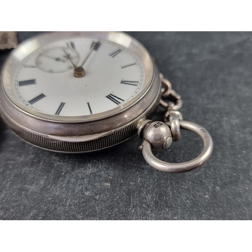 405 - A Victorian silver key wind open faced pocket watch, by C H Nicholls, Castleford, 53mm, No 12583, Ch... 