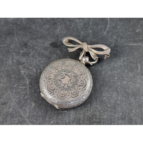 407 - An Edwardian white metal open faced key wind fob watch, 36mm, stamped '.935' and with Swiss conventi... 