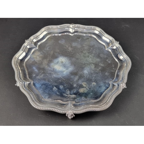 41 - A silver salver, by Walker & Hall, Sheffield, date letter rubbed, 17cm wide, 587g.... 