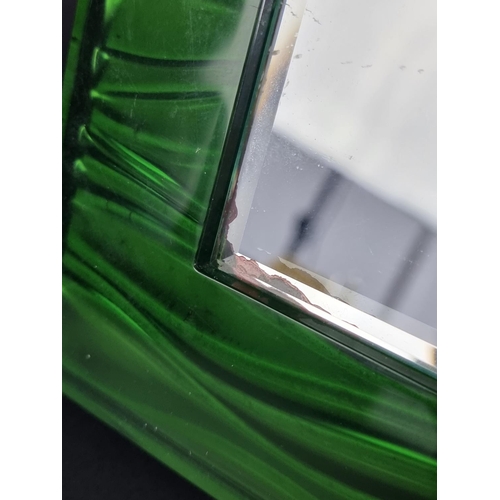 412 - A Rolex green leather and acrylic easel back retailer's mirror, 25cm.