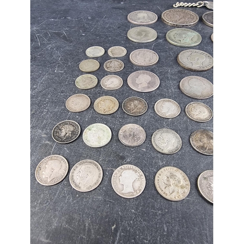 424 - Coins: a quantity of UK silver and part silver coinage, William IV to George VI to include an 1838 s... 