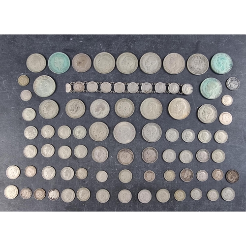 437 - Coins: a quantity of UK silver and part silver coinage, mostly George V and George VI, gross weight ... 