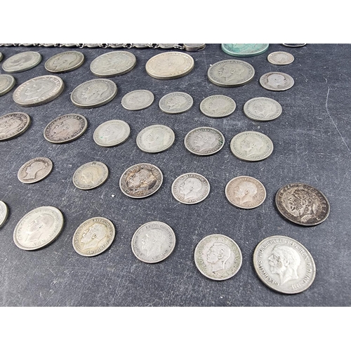 437 - Coins: a quantity of UK silver and part silver coinage, mostly George V and George VI, gross weight ... 