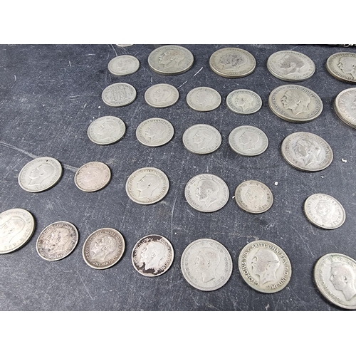 437 - Coins: a quantity of UK silver and part silver coinage, mostly George V and George VI, gross weight ... 