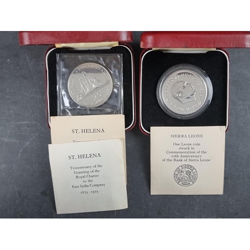 441 - Coins: two Maria Theresa 1780 thalers; together with a cased Sierra Leone 1974 silver proof 1 Leone,... 