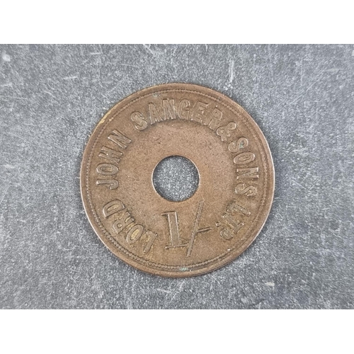 451 - Token: a brass 'Lord John Sanger and Sons Ltd' one shilling token.