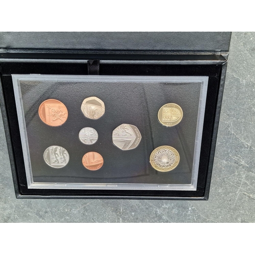 464 - Coins: a Royal Mint 2014 UK proof coin set, with CoA, cased.