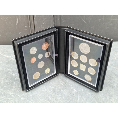 469 - Coins: a Royal Mint 2016 UK proof coin set, with CoA, cased.