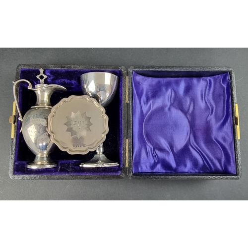 47 - A cased Victorian silver communion set, by Colen Hewer Cheshire, Birmingham 1881 and 1891, 132g... 