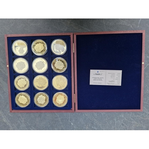 474 - Coins: five Windsor Mint gold plated coin collections; to include 'Monarchy of Queen Elizabeth II' a... 