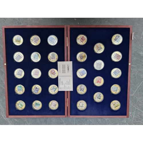 474 - Coins: five Windsor Mint gold plated coin collections; to include 'Monarchy of Queen Elizabeth II' a... 