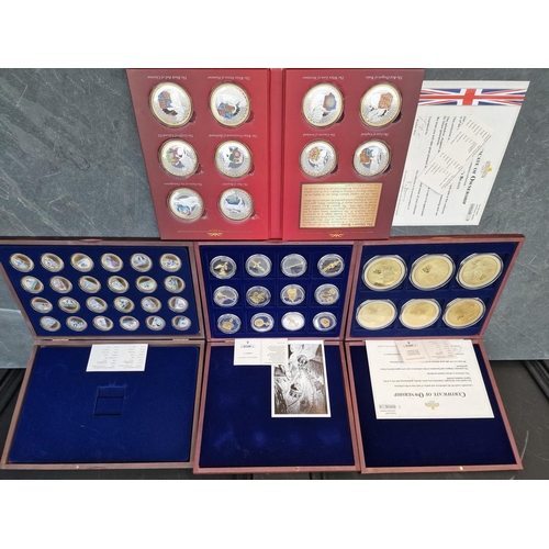 475 - Coins: four Windsor Mint gold plated coin collections; to include an Elizabeth II commemorative set ... 