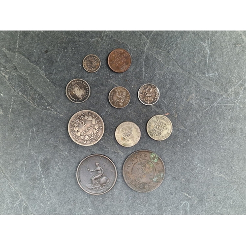 477 - Coins: a group of coins, to include: a Victoria 1838 maundy two pence; a Victoria 1886 Cyprus 1 pias... 