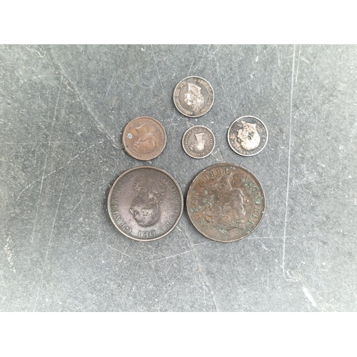 477 - Coins: a group of coins, to include: a Victoria 1838 maundy two pence; a Victoria 1886 Cyprus 1 pias... 