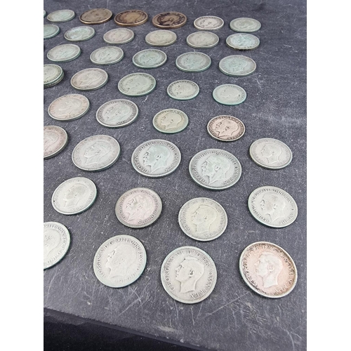 481 - Coins: a quantity of George V and George VI .500 silver coinage, 291g.