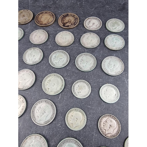 481 - Coins: a quantity of George V and George VI .500 silver coinage, 291g.