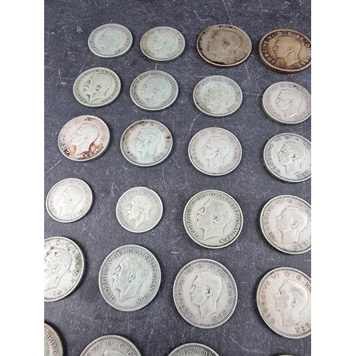 481 - Coins: a quantity of George V and George VI .500 silver coinage, 291g.