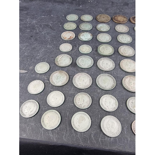 481 - Coins: a quantity of George V and George VI .500 silver coinage, 291g.