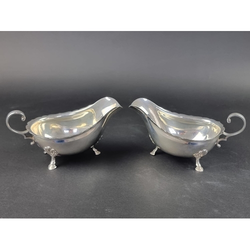 5 - A pair of silver sauce boats, by Harrison Brothers & Howson, London 1911 and Sheffield 1910, hei... 