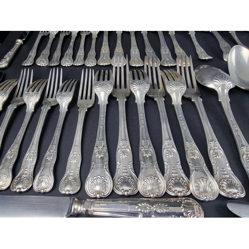 56 - A George IV silver canteen of Kings Honeysuckle with Union Shell pattern cutlery for twelve, to incl... 