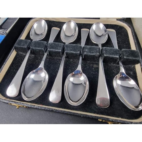 57 - A cased set of six silver teaspoons, by A L Davenport Ltd, Birmingham 1957; together with three case... 