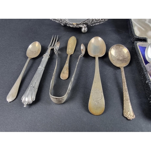 58 - A cased set of six silver teaspoons, by Sir John Bennett Ltd, London 1932; together with seven other... 