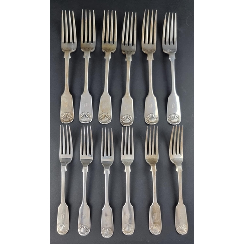 59 - A set of six Victorian silver fiddle and shell pattern table forks and six matching dessert forks, b... 